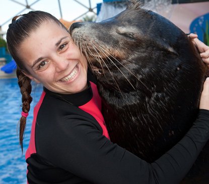 woman with seal in seaquarium in florida